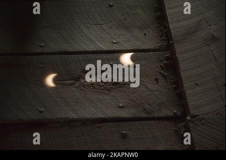 A total solar eclipse occurs on August 21, 2017, at Mary's River Covered Bridge, in Chester, IL, USA. (Photo by Patrick Gorski/NurPhoto) Stock Photo