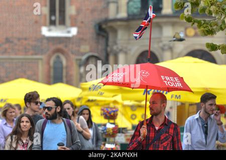 Free Walking Tour in Krakow's City Center. On Wednesday, August 22, 2017, in Krakow, Poland. (Photo by Artur Widak/NurPhoto)  Stock Photo
