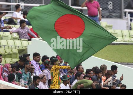 Bangladeshi Fans cheer during day two of the First Test match between Bangladesh and Australia at Shere Bangla National Stadium on August 28, 2017 in Mirpur, Bangladesh. (Photo by Ahmed Salahuddin/NurPhoto) Stock Photo