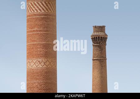 Industrial chimneys made of patterned red bricks on the banks of the river Nile, Egypt Stock Photo