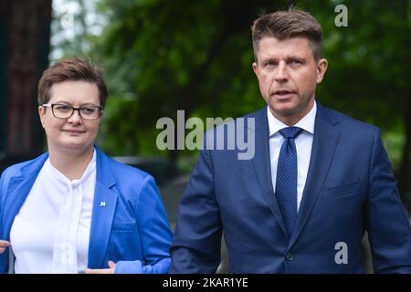 Katarzyna Lubnauer, the Chairman of the Parliamentary Club of 'Nowoczesna' (English: Modern) Political Pary, and Ryszard Petru, the Leader of 'Nowoczesna' arrive for the press conference about the future of Polish education from 'Nowoczesna' point of view, organised in Warsaw on the starting day of 2017/2018 school year. On Monday, September 4, 2017, in Warsaw, Poland. (Photo by Artur Widak/NurPhoto)  Stock Photo