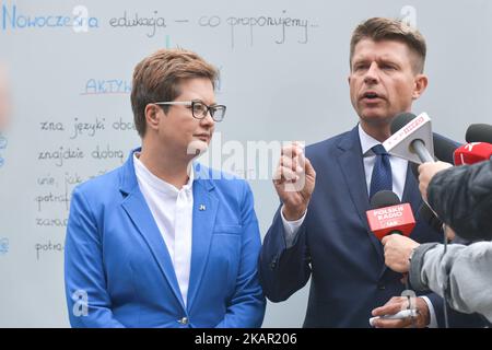 Katarzyna Lubnauer, the Chairman of the Parliamentary Club of 'Nowoczesna' (English: Modern) Political Pary, and Ryszard Petru, the Leader of 'Nowoczesna' adress the press conference about the future of Polish education from 'Nowoczesna' point of view, organised in Warsaw on the starting day of 2017/2018 school year. On Monday, September 4, 2017, in Warsaw, Poland. (Photo by Artur Widak/NurPhoto)  Stock Photo