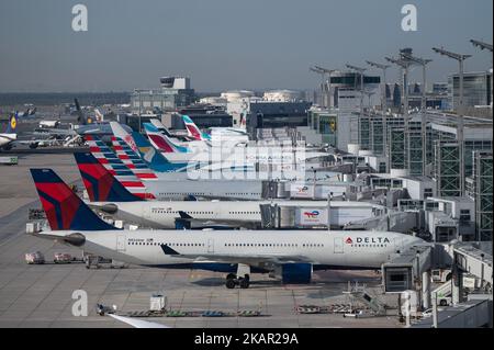03 November 2022, Hessen, Frankfurt/Main: An Airbus A330-200 of the airline Delta stands in front of other aircraft at a gate at Frankfurt airport. Photo: Sebastian Gollnow/dpa Stock Photo
