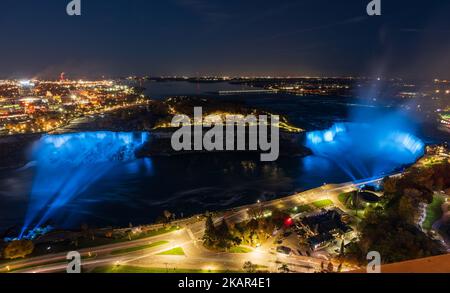 Aerial view of Niagara Falls American Falls Horseshoe Falls night illumination. Stock Photo