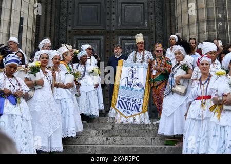 Every year since 16th years the priest of La Madeleine in Paris welcome the Afro-Brazilian priest named Babalorisa Leo Ty o Sun and the festival of the Cleaning of la Madeleine in Paris, France, on 5 September 2017. Brazilian gathered to clean the marches of the church in symbol of the slaves who doesn't were allowed to enter the churches in Salvador de Baia, Brazil(Photo by Julien Mattia/NurPhoto) Stock Photo