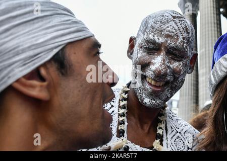 Every year since 16th years the priest of La Madeleine in Paris welcome the Afro-Brazilian priest named Babalorisa Leo Ty o Sun and the festival of the Cleaning of la Madeleine in Paris, France, on 5 September 2017. Brazilian gathered to clean the marches of the church in symbol of the slaves who doesn't were allowed to enter the churches in Salvador de Baia, Brazil(Photo by Julien Mattia/NurPhoto) Stock Photo