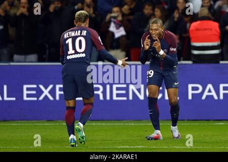 Kylian Mbappe of PSG celebrates his goal with Neymar Jr during the Ligue 1 match between Paris Saint Germain and Olympique Lyonnais at Parc des Princes on September 17, 2017 in Paris, France. (Photo by Mehdi Taamallah/NurPhoto) Stock Photo