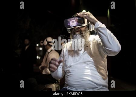 Over 40,000 pilgrims from 12 countries have arrived in Uman, Ukraine, to celebrate the Jewish New Year (Rosh Hashanah), September 20–22, 2017. Followers of the Breslov Hasidic movement come to Uman every year to pray at the grave of the movement's founder, Reb Nachman, a a great-grandson of the founder of Hasidic Judaism. (Photo by Oleksandr Rupeta/NurPhoto) Stock Photo