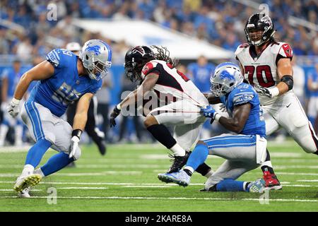 Atlanta Falcons running back Devonta Freeman (24) is tackled by Detroit Lions middle linebacker Tahir Whitehead (59) during the first half of an NFL football game in Detroit, Michigan on September 24, 2017. (Photo by Jorge Lemus/NurPhoto) Stock Photo