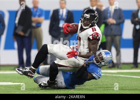 Atlanta Falcons wide receiver Julio Jones (11) is tackled by Detroit Lions cornerback Darius Slay (23) during the second half of an NFL football game in Detroit, Michigan on September 24, 2017. (Photo by Jorge Lemus/NurPhoto) Stock Photo
