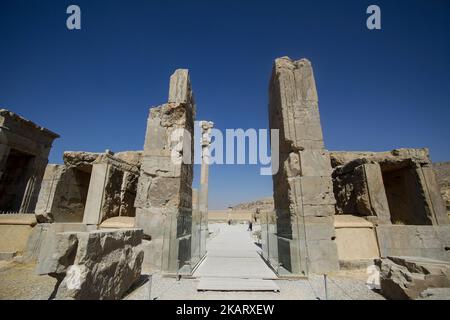 Ancient Persepolis, a capital of the Achaemenid Empire 550 - 330 BC in Iran, a UNESCO world heritage site. . Archaelogical site and ruins of gates and columns of the Persian Achaemenid dynasty ancient capital city of Takht-e Jamshid, or Persepolis, destroyed by Alexander the Great, the Greek Macedonian king, a UNESCO World Heritage site and touristic landmark of Iran, near the southern city of Shiraz in Fars province. Some of the most famous landmarks there are the Gate of All Nations, Palace of Darius the Great, also known as the Tachara, Intricate carving, Carved Achaemenid columns, double h Stock Photo