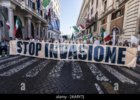 National Movement for Sovereignty, an Italian national-conservative political party, held a demonstration to protest against the invasion of immigrants and to defend the Italian work in Rome, Italy on October 14, 2017.(Photo by Giuseppe Ciccia/NurPhoto) Stock Photo