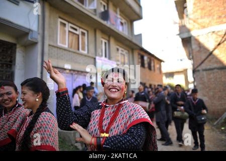 Newari People dance in a traditional instruments during Newari New Year parade Nhu Dan (the Newari New Year) falls during Tihar or Deepawali and Dewali “Festival of Lights” at Kirtipur, Kathmandu, Nepal on Friday, October 20, 2017. Newar community in Nepal observes Newari New Year 1138. (Photo by Narayan Maharjan/NurPhoto) Stock Photo