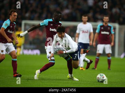 Tottenham Hotspur's Son Heung-Min gets browght down by West Ham United's Cheikhou Kouyate during Carabao Cup 4th Round match between Tottenham Hotspur and West Ham United at Wembley Stadium in London, England on October 25, 2017. (Photo by Kieran Galvin/NurPhoto)  Stock Photo