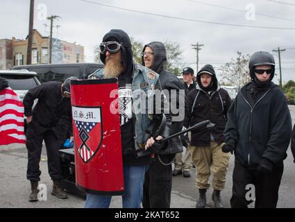(171027) -- Shelbyville, October 27, 2017 -- A member of the National Socialist Movement holds a shield and a microphone stand before a White Lives Matter rally in Shelbyville, Tennessee, United States on October 27, 2017. (Photo by Emily Molli/NurPhoto) Stock Photo