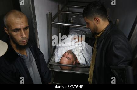 The bodies of Palestinians killed after a tunnel stretching from the Gaza Strip into Israel at a morgue at al-Aqsa hospital in Deir el-Balah, in central Gaza, on October 30, 2017. Ashraf al-Qudra, spokesman for the Hamas-led Gazan health ministry, confirmed at least six people had been killed. Tunnels dug by Gaza's Islamist rulers Hamas were a key issue in the last war with Israel in 2014. (Photo by Majdi Fathi/NurPhoto) Stock Photo