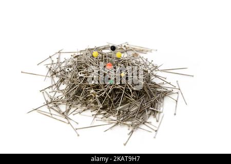 A pile of Garment pins on the white background Stock Photo