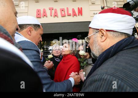 Imam of Drancy, Hassen Chalghoumi (2nd L) and other members of religious communities speak together and with other people in front of the Bataclan concert during ceremonies across Paris marking the second anniversary of the terror attacks of November 2015 in which 130 people were killed, in the French capital on November 13, 2017. France on November 13, 2017 marks two years since its worst ever terror attacks, when jihadists killed 130 people in Paris and injured hundreds of others. (Photo by Michel Stoupak/NurPhoto) Stock Photo