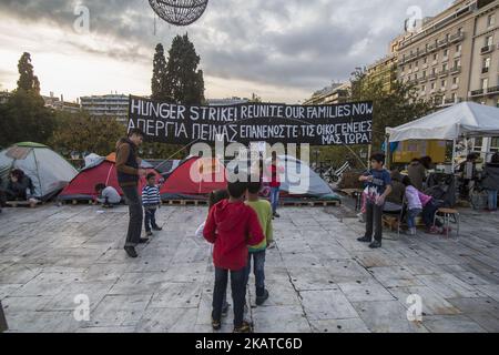 Syrian refugees are protesting for almost 2 weeks with a hunger strike and staying in tents in front of the Hellenic parlianment in Athens, Greece, on 16 November 2017 as they request from the authorities to respect the legal limit of six months for family reunification. Refugees are demanding to be reunited with their families in northwest Europe like Germany or Sweden. The settlement is between the Greek parliament and over the daily overcrowded Syntagma Square and metro station. (Photo by Nicolas Economou/NurPhoto) Stock Photo