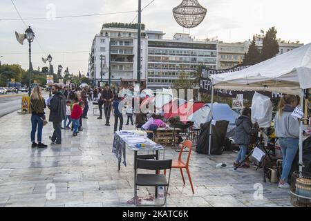 Syrian refugees are protesting for almost 2 weeks with a hunger strike and staying in tents in front of the Hellenic parlianment in Athens, Greece, on 16 November 2017 as they request from the authorities to respect the legal limit of six months for family reunification. Refugees are demanding to be reunited with their families in northwest Europe like Germany or Sweden. The settlement is between the Greek parliament and over the daily overcrowded Syntagma Square and metro station. (Photo by Nicolas Economou/NurPhoto) Stock Photo