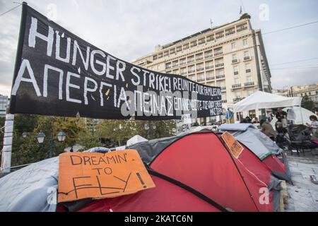 Syrian refugees are protesting for almost 2 weeks with a hunger strike and staying in tents in front of the Hellenic parlianment in Athens, Greece, on 16 November 2017 as they request from the authorities to respect the legal limit of six months for family reunification. Refugees are demanding to be reunited with their families in northwest Europe like Germany or Sweden. The settlement is between the Greek parliament and over the daily overcrowded Syntagma Square and metro station. (Photo by Nicolas Economou/NurPhoto) Stock Photo