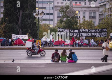 Syrian refugees are protesting for almost 2 weeks with a hunger strike and staying in tents in front of the Hellenic parlianment in Athens, Greece, on 16 November 2017 as they request from the authorities to respect the legal limit of six months for family reunification. Refugees are demanding to be reunited with their families in northwest Europe like Germany or Sweden. The settlement is between the Greek parliament and over the daily overcrowded Syntagma Square and metro station. (Photo by Nicolas Economou/NurPhoto) Stock Photo