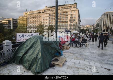 Syrian refugees are protesting for almost 2 weeks with a hunger strike and staying in tents in front of the Hellenic parlianment in Athens, Greece, on 16 November 2017 as they request from the authorities to respect the legal limit of six months for family reunification. Refugees are demanding to be reunited with their families in northwest Europe like Germany or Sweden. The settlement is between the Greek parliament and over the daily overcrowded Syntagma Square and metro station. (Photo by Nicolas Economou/NurPhoto) Stock Photo