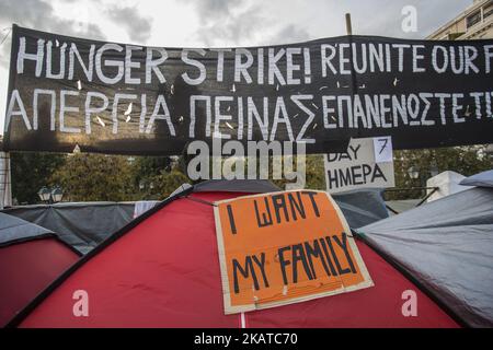 Syrian refugees are protesting for almost 2 weeks with a hunger strike and staying in tents in front of the Hellenic parlianment in Athens, Greece, on 16 November 2017 as they request from the authorities to respect the legal limit of six months for family reunification. Refugees are demanding to be reunited with their families in northwest Europe like Germany or Sweden. The settlement is between the Greek parliament and over the daily overcrowded Syntagma Square and metro station. (Photo by Nicolas Economou/NurPhoto) Stock Photo