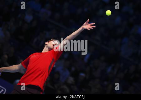 Austria's Dominic Thiem serves to Spain's Pablo Carreno Busta during their men's singles round-robin match on day four of the ATP World Tour Finals tennis tournament at the O2 Arena in London on November 15 2017. (Photo by Alberto Pezzali/NurPhoto) Stock Photo