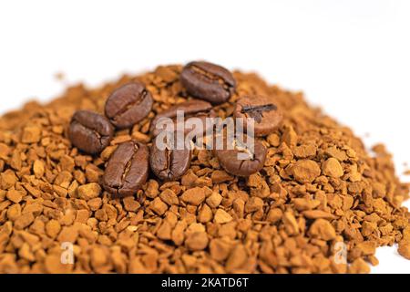 Instant coffee beans against a white background Stock Photo