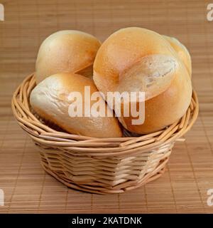 Wheat buns in the basket Stock Photo
