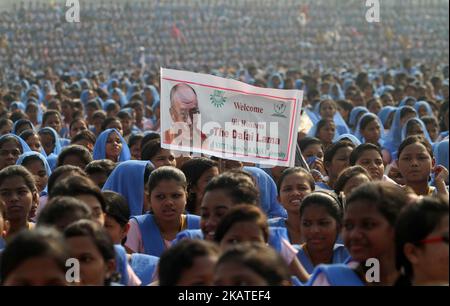 People attend visit of Tibetan spiritual leader Dalai Lama in the eastern Indian state Odishaâ€™s capital city Bhubaneswar, on 21 November 2017. (Photo by STR/NurPhoto) Stock Photo