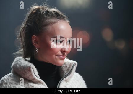 French-American actress and model Lily-Rose Depp poses before officially switching on the Champs Elysees Christmas lights on the Champs Elysees avenue in Paris on November 22, 2017. (Photo by Michel Stoupak/NurPhoto) Stock Photo