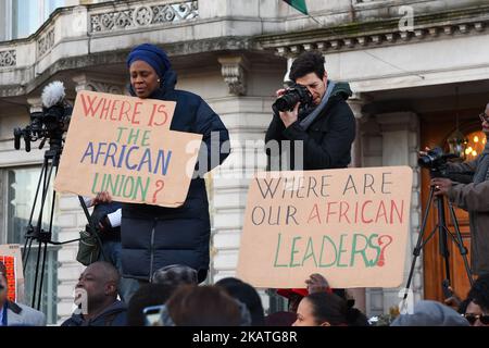 People gathered outside the Libyan Embassy in Knightsbridge, London on November 26, 2017 to protest the reported ongoing modern slave trade in Libya. (Photo by Alberto Pezzali/NurPhoto) Stock Photo