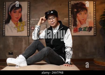 Cinema billboard artist Jimmy Keung Chi-ming photographed with his art ...