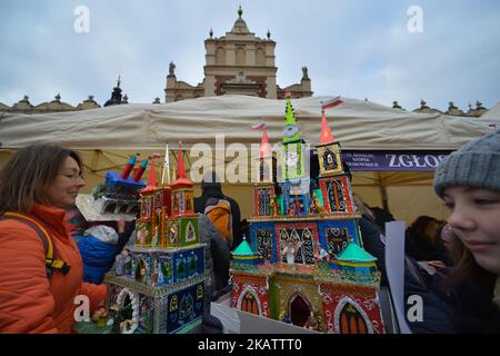 People bring the Nativity Scene in Krakow's Main Square, during the 75th Nativity Scene Contest. On Thursday, 7 December 2017, in Krakow, Poland. (Photo by Artur Widak/NurPhoto) Stock Photo