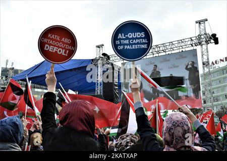 Women hold up placards as pro-Palestinian protesters take part in a rally against U.S. President Donald Trump's recognition the city of Jerusalem as the capital of Israel, in Ankara, Turkey on December 17, 2017. (Photo by Altan Gocher/NurPhoto) Stock Photo