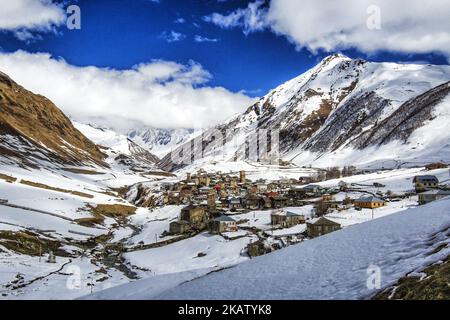 Snow covered Ushguli village at the foot of Mt. Shkhara in Georgia. Ushguli is part of the Upper Svaneti area that is in the list of UNESCO World Heritage Sites. People still life in a rural way and use their old heritage, their unique towers. It is also one of the highest inhabited village in Europe. (Photo by Nicolas Economou/NurPhoto) Stock Photo