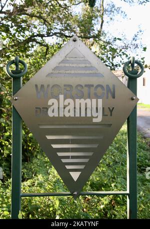 A road sign at the entrance to the village, Worston, Clitheroe, Lancashire, United Kingdom Stock Photo