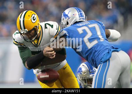 Green Bay Packers quarterback Brett Favre (4) fumbles the ball during a  sack by Miami Dolphins defensive end Jason Taylor (99). The Dolphins  recovered on the Packer 8 yard line at Dolphins