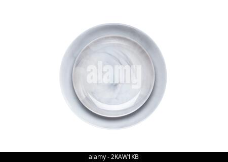 Two empty ceramics dessert plates isolated on white background. Mockup with copy space. Top view. Gray ceramic dish. Trendy modern design, serving con Stock Photo