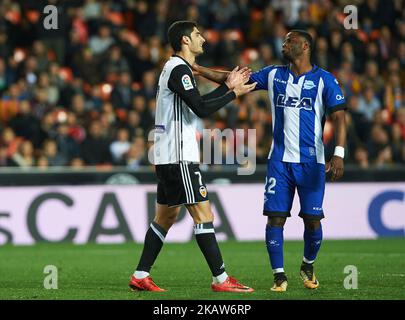 Gonzalo Guedes of Valencia CF and Wakaso Mubarak of Deportivo Alaves during the Spanish Copa del Rey, Round of 8, match between Valencia CF and Deportivo Alaves at Estadio de Mestalla on jenuary 17, 2018 in Valencia, Spain. (Photo by Maria Jose Segovia/NurPhoto) Stock Photo