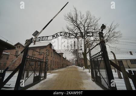 A view of 'Arbeit Macht Frei sign (English: Work sets you free) on the entrence gate to the former Auschwitz 1 camp, just a few days ahead of the 73rd Anniversary of the Liberation of Auschwitz camp. On Tuesday, January 23, 2018, in Auschwitz concentration camp, Oswiecim, Poland. (Photo by Artur Widak/NurPhoto) Stock Photo