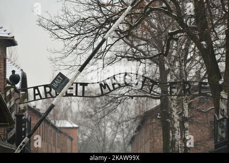 A view of 'Arbeit Macht Frei sign (English: Work sets you free), on the entrence gate to the former Auschwitz 1 camp, just a few days ahead of the 73rd Anniversary of the Liberation of Auschwitz camp. On Tuesday, January 23, 2018, in Auschwitz concentration camp, Oswiecim, Poland. (Photo by Artur Widak/NurPhoto) Stock Photo