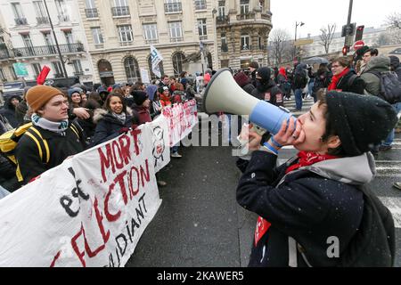 Protesters shout slogans and hold banners as they take part in a demonstration against a French government's proposed reform of university applications and a project to reform the French baccalaureate high school exit exam on February 6, 2018, in Paris. (Photo by Michel Stoupak/NurPhoto) Stock Photo