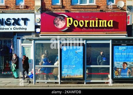 Colourful multicultural shop fronts in Southall Greater London England ...
