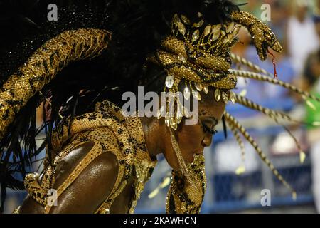 A reveller of the IMPERATRIZ LEOPOLDINENSE samba-swing school performs during the first night of Rio's Carnival at the Sambadrome in Rio, Brazil, on February 12, 2018. (Photo by Gilson Borba/NurPhoto) Stock Photo