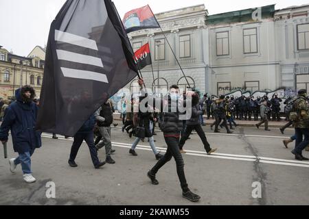 Right-wing activists during their rally in Kiev, Ukraine, February 18, 2018. Supporters and activists of Ukrainian nationalists are protesting against Russian aggression in Ukraine. (Photo by Oleg Pereverzev/NurPhoto) Stock Photo