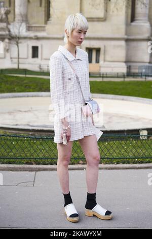 Guest attends the Chanel show as part of the Paris Fashion Week Womenswear Fall/Winter 2018/2019 at Le Grand Palais on March 6, 2018 in Paris, France. (Photo by Nataliya Petrova/NurPhoto) Stock Photo