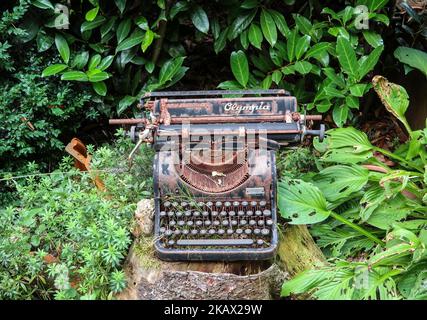Rusty old Olympia typewriter. Stock Photo